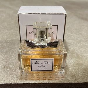 Miss Dior Cherie 100ML. Sprayed a few times.